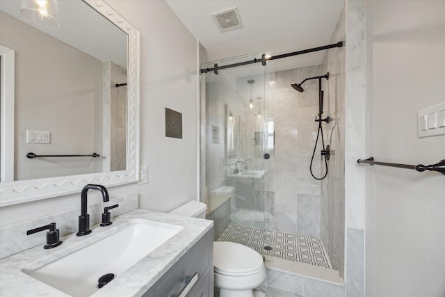 5211 Briarbend Dr, Houston, TX 77035 - bathroom featuring toilet, a stall shower, and vanity