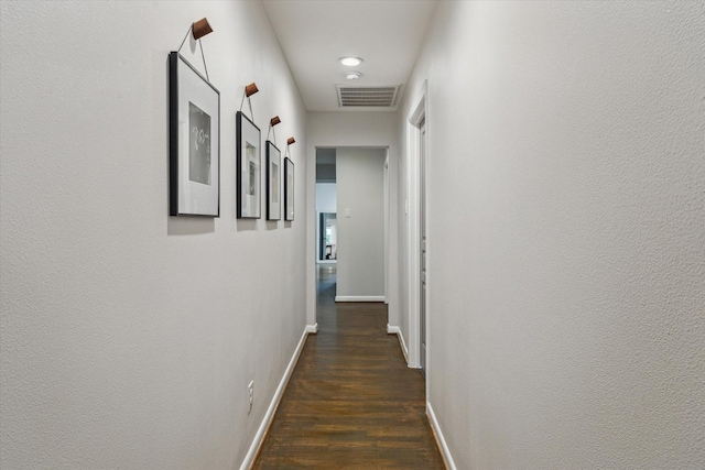5211 Briarbend Dr, Houston, TX 77035 - hall featuring baseboards and dark wood-type flooring