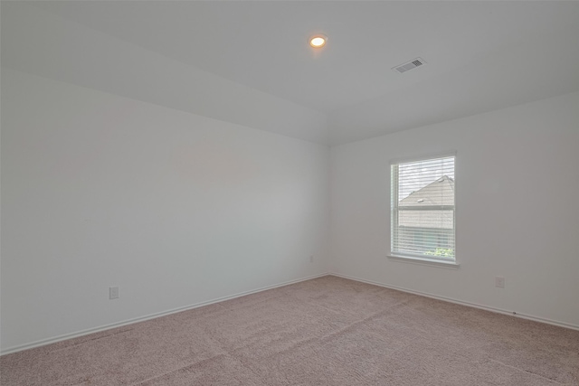 23922 Olivenza Trl, New Caney, TX 77357 - unfurnished room featuring light carpet and recessed lighting