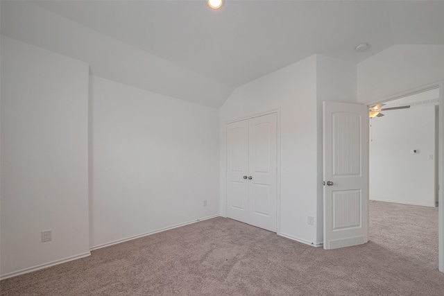 23922 Olivenza Trl, New Caney, TX 77357 - additional living space featuring vaulted ceiling, carpet, and ceiling fan