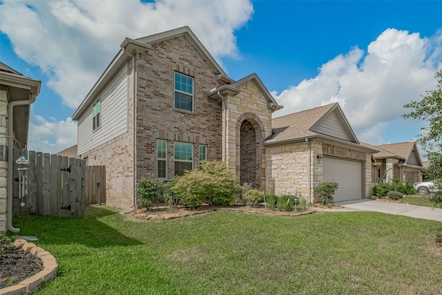 23922 Olivenza Trl, New Caney, TX 77357 - view of front of house with concrete driveway, a garage, brick siding, stone siding, and roof with shingles
