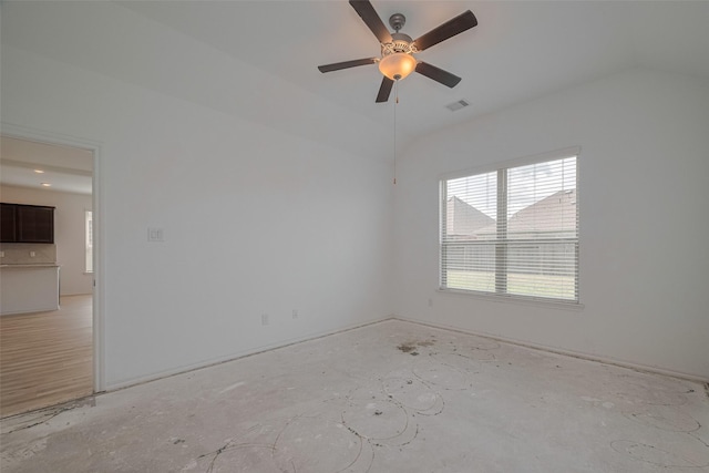 23922 Olivenza Trl, New Caney, TX 77357 - unfurnished room with vaulted ceiling and ceiling fan