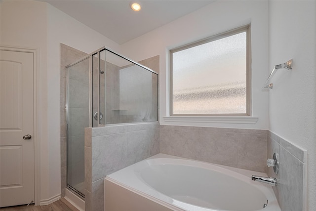 23922 Olivenza Trl, New Caney, TX 77357 - full bathroom with a garden tub and a stall shower