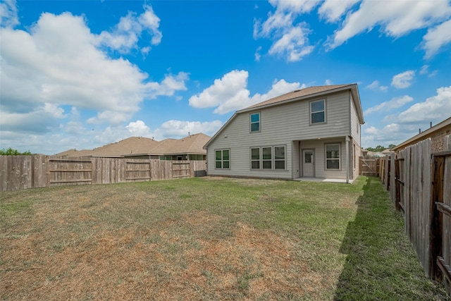 23922 Olivenza Trl, New Caney, TX 77357 - back of property featuring a fenced backyard