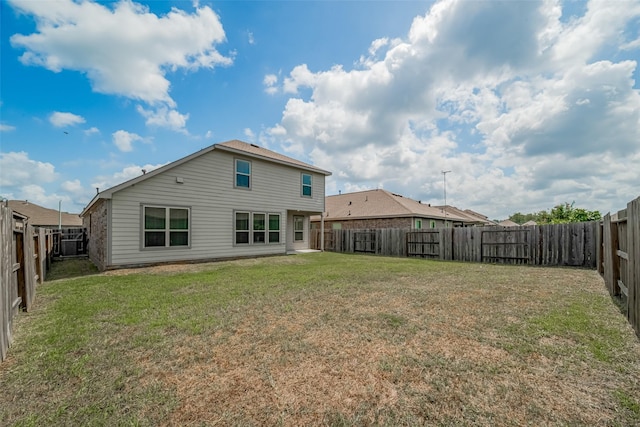 23922 Olivenza Trl, New Caney, TX 77357 - rear view of property featuring a fenced backyard