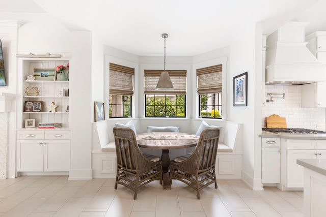 31 Wood Cove Dr, The Woodlands, TX 77381 - dining space featuring breakfast area and light tile patterned floors
