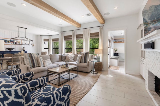 31 Wood Cove Dr, The Woodlands, TX 77381 - living area featuring light tile patterned flooring, beam ceiling, a chandelier, baseboards, and recessed lighting