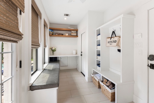 31 Wood Cove Dr, The Woodlands, TX 77381 - mudroom featuring light tile patterned floors and recessed lighting
