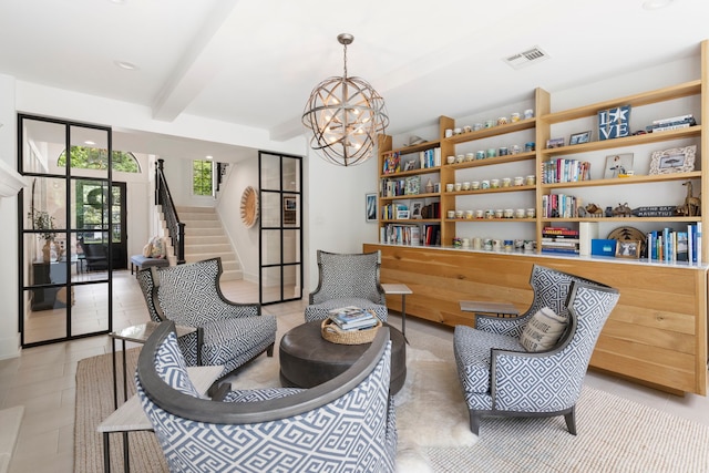 31 Wood Cove Dr, The Woodlands, TX 77381 - sitting room featuring a chandelier, beamed ceiling, light tile patterned floors, stairway, and recessed lighting