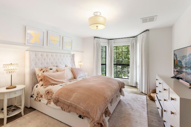 31 Wood Cove Dr, The Woodlands, TX 77381 - bedroom featuring wood finished floors