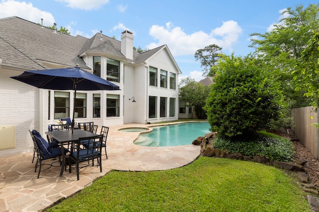 31 Wood Cove Dr, The Woodlands, TX 77381 - view of pool featuring a patio area and a pool with connected hot tub