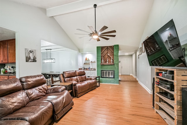 2307 Jackson Ln, League City, TX 77573 - living area featuring light wood-style floors, a ceiling fan, high vaulted ceiling, beam ceiling, and a chandelier