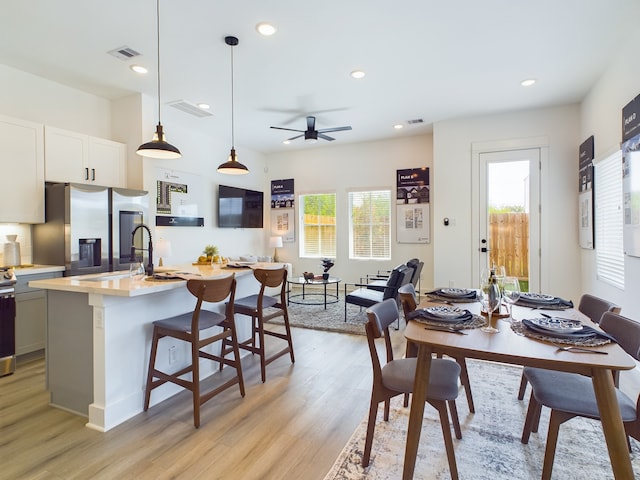 3004 Jensen Springs Ln, Houston, TX 77026 - dining room featuring light wood-type flooring, recessed lighting, and ceiling fan