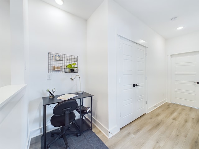 3004 Jensen Springs Ln, Houston, TX 77026 - office with light wood-style floors and recessed lighting