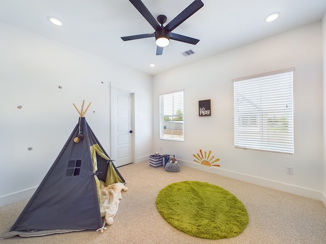 3004 Jensen Springs Ln, Houston, TX 77026 - playroom featuring carpet flooring, a ceiling fan, and recessed lighting