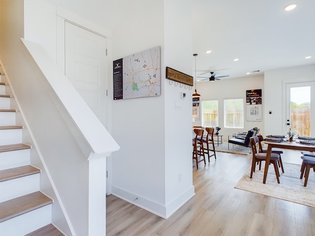 3004 Jensen Springs Ln, Houston, TX 77026 - stairway with a ceiling fan, wood finished floors, recessed lighting, and plenty of natural light