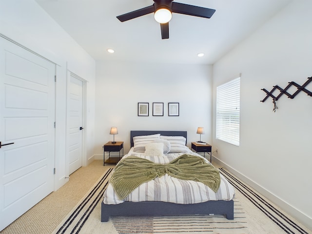 3004 Jensen Springs Ln, Houston, TX 77026 - bedroom with ceiling fan, recessed lighting, and light colored carpet