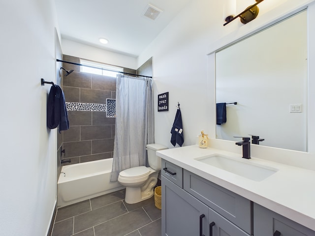 3004 Jensen Springs Ln, Houston, TX 77026 - bathroom featuring tile patterned floors, vanity, and shower / tub combo