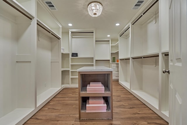 6326 Bayonne Dr, Spring, TX 77389 - walk in closet with wood finished floors