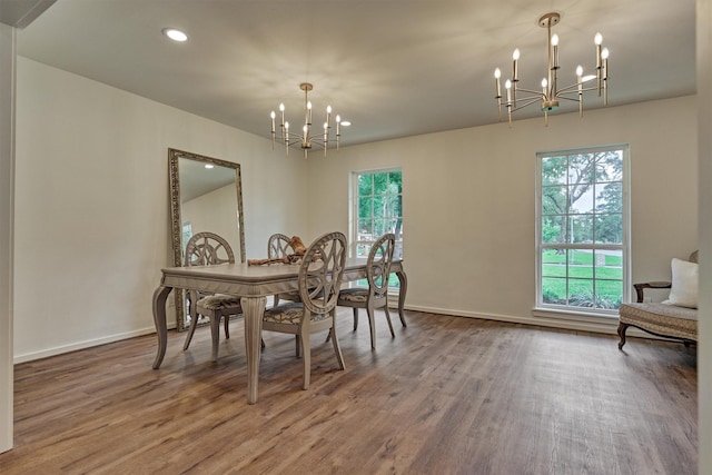 6326 Bayonne Dr, Spring, TX 77389 - dining room featuring a chandelier, wood finished floors, recessed lighting, and baseboards