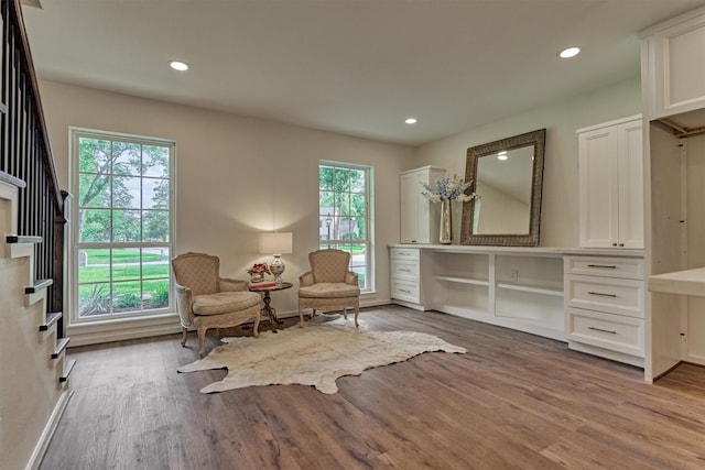 6326 Bayonne Dr, Spring, TX 77389 - sitting room featuring plenty of natural light, stairs, wood finished floors, and recessed lighting
