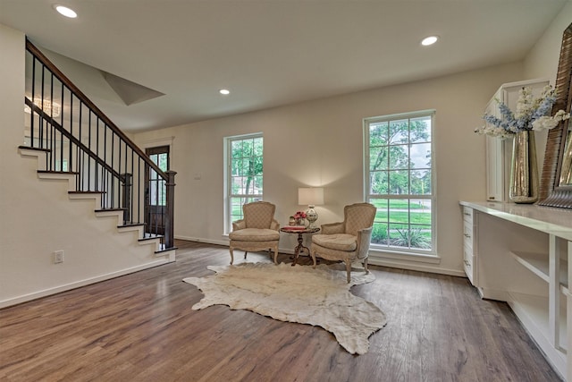 6326 Bayonne Dr, Spring, TX 77389 - sitting room with healthy amount of natural light, wood finished floors, stairs, baseboards, and recessed lighting