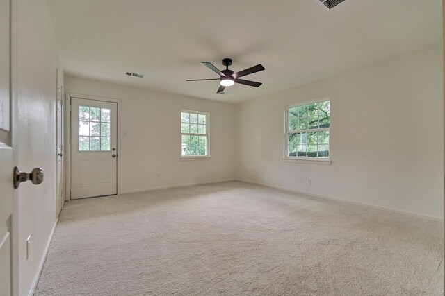 6326 Bayonne Dr, Spring, TX 77389 - unfurnished room featuring healthy amount of natural light and carpet flooring