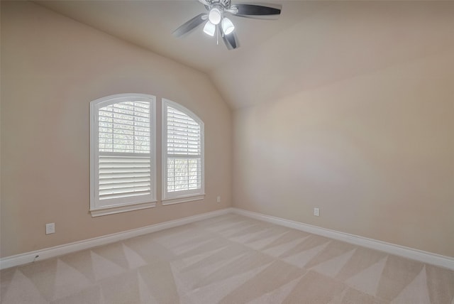 4131 Regal Stone Ln, Sugar Land, TX 77479 - unfurnished room with light colored carpet, a ceiling fan, baseboards, and lofted ceiling