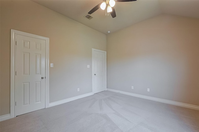 4131 Regal Stone Ln, Sugar Land, TX 77479 - empty room with lofted ceiling, ceiling fan, light colored carpet, and baseboards