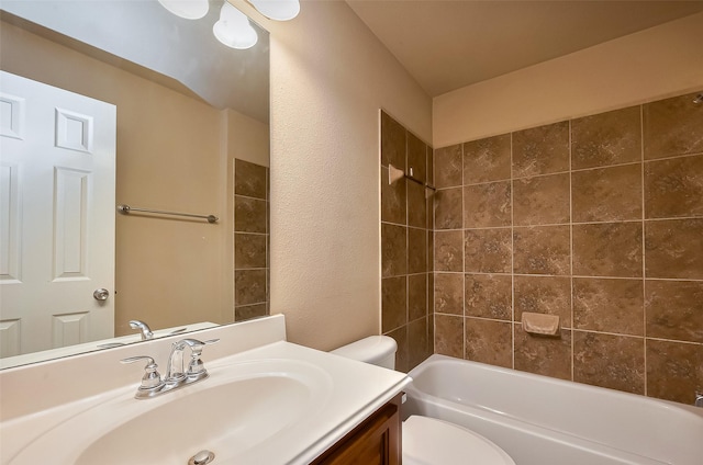 4131 Regal Stone Ln, Sugar Land, TX 77479 - bathroom with toilet, vanity, shower / washtub combination, and a textured wall