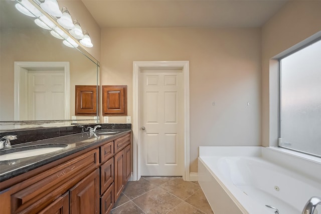4131 Regal Stone Ln, Sugar Land, TX 77479 - full bath with double vanity and a tub with jets