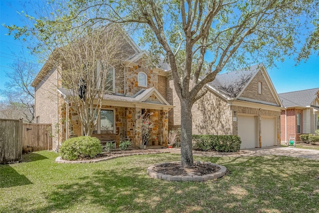 4131 Regal Stone Ln, Sugar Land, TX 77479 - view of front of property with a garage, stone siding, driveway, and brick siding