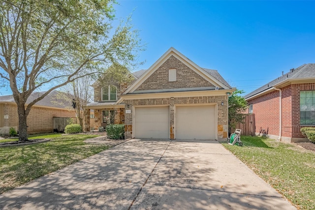 4131 Regal Stone Ln, Sugar Land, TX 77479 - view of front of property featuring brick siding, driveway, a garage, and stone siding