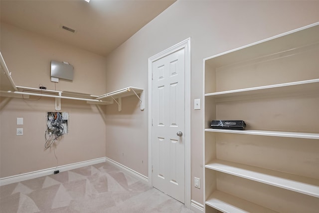4131 Regal Stone Ln, Sugar Land, TX 77479 - spacious closet featuring carpet flooring