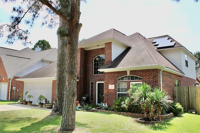 3231 Brinton Trails Ln, Katy, TX 77494 - traditional-style house featuring brick siding, driveway, a garage, and a shingled roof