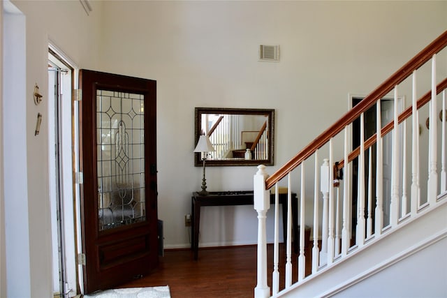 3231 Brinton Trails Ln, Katy, TX 77494 - foyer entrance featuring wood finished floors, stairs, plenty of natural light, baseboards, and a towering ceiling
