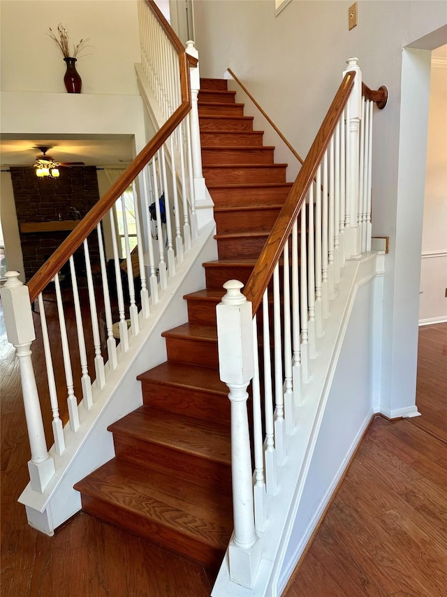 3231 Brinton Trails Ln, Katy, TX 77494 - stairs with wood finished floors, baseboards, and ceiling fan