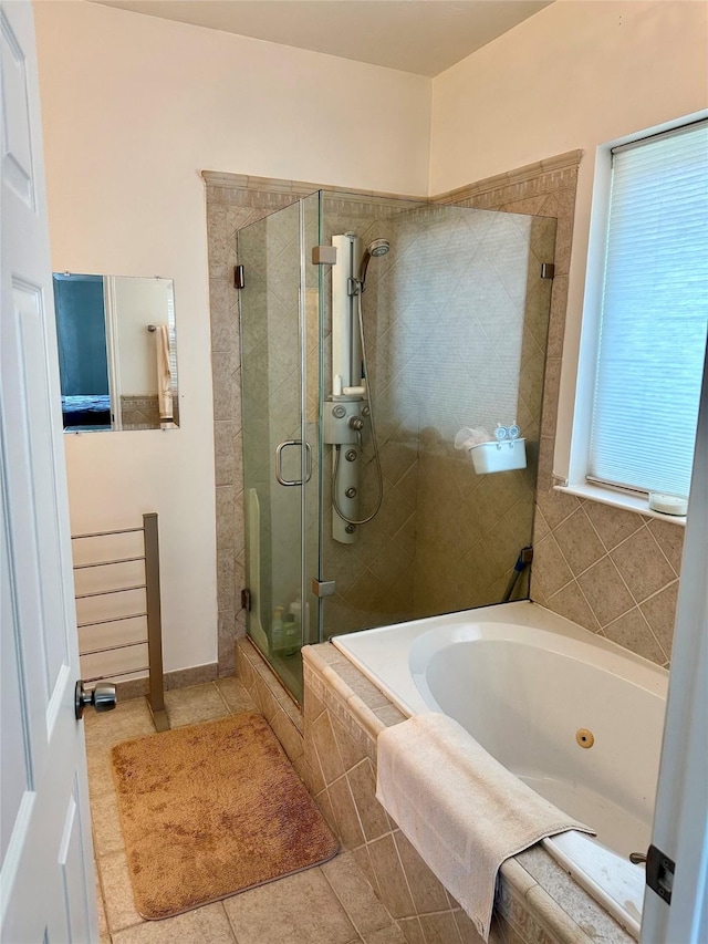 3231 Brinton Trails Ln, Katy, TX 77494 - bathroom featuring a shower stall, a whirlpool tub, and tile patterned flooring