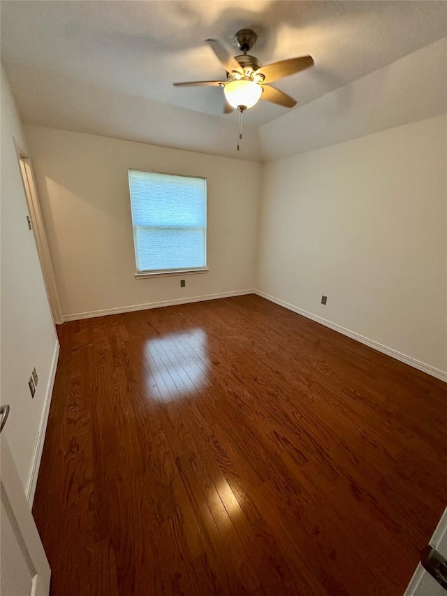 3231 Brinton Trails Ln, Katy, TX 77494 - unfurnished room featuring dark wood finished floors, ceiling fan, and baseboards