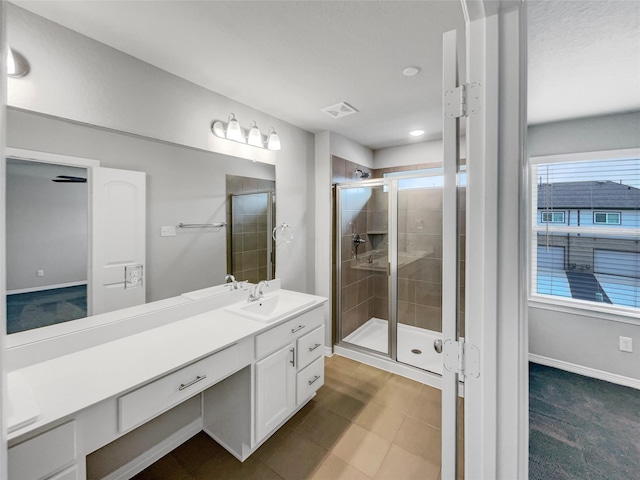 8022 Scanlan Trce, Missouri City, TX 77459 - full bath with a stall shower, vanity, and baseboards