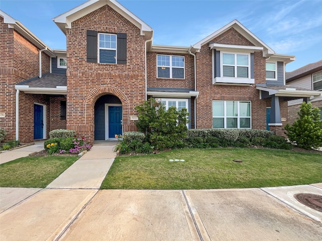 8022 Scanlan Trce, Missouri City, TX 77459 - view of property featuring brick siding and a front yard