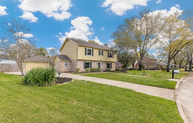 7514 Renmark Ln, Houston, TX 77070 - colonial home featuring brick siding and a chimney