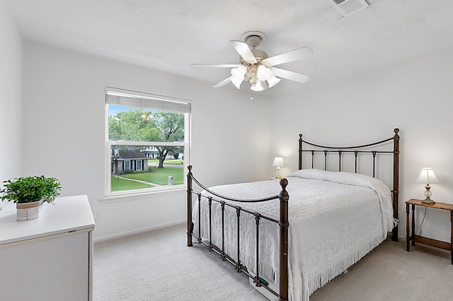 7514 Renmark Ln, Houston, TX 77070 - bedroom featuring light carpet and ceiling fan