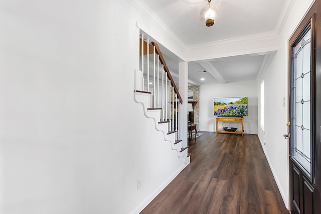 7514 Renmark Ln, Houston, TX 77070 - entryway featuring dark wood-type flooring, beam ceiling, stairway, and crown molding
