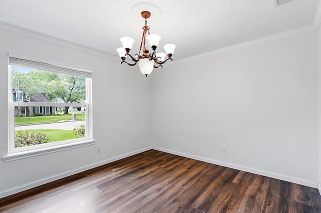 7514 Renmark Ln, Houston, TX 77070 - spare room with a chandelier, dark wood finished floors, and crown molding