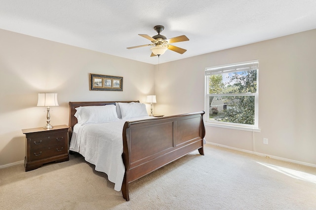 7514 Renmark Ln, Houston, TX 77070 - bedroom with light colored carpet and a ceiling fan