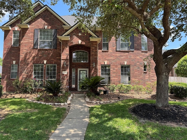 11703 Sterling Brook St, Pearland, TX 77584 - traditional home featuring brick siding and a front yard