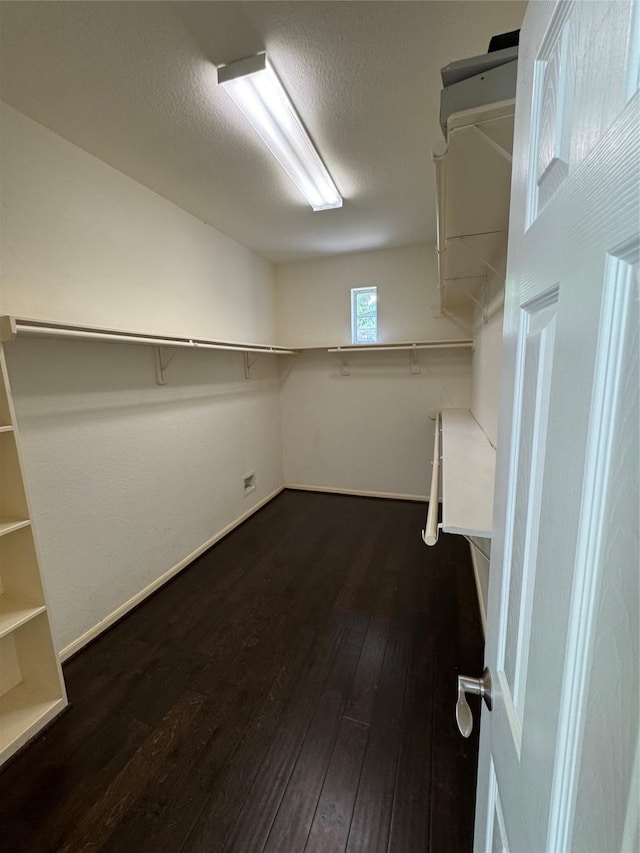 11703 Sterling Brook St, Pearland, TX 77584 - spacious closet featuring dark wood finished floors