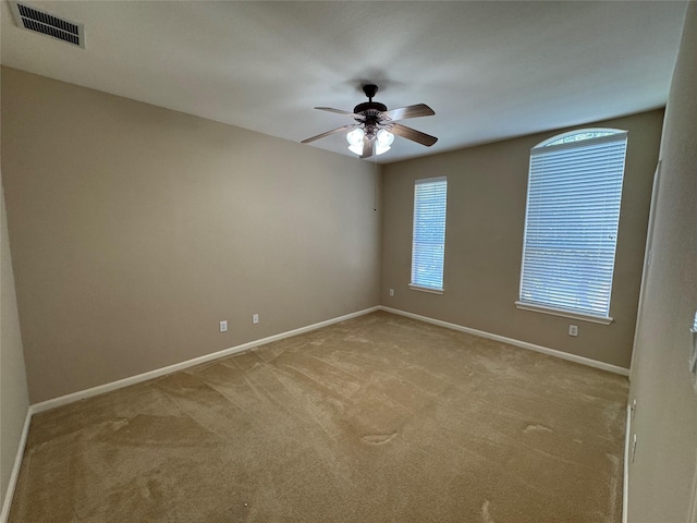 11703 Sterling Brook St, Pearland, TX 77584 - carpeted empty room featuring a ceiling fan, healthy amount of natural light, and baseboards