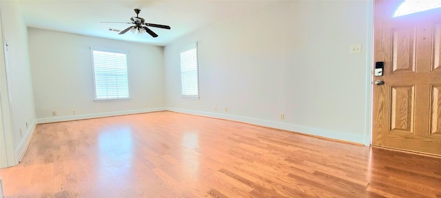 1401 Truxillo St, Houston, TX 77004 - entryway featuring light wood-style flooring, baseboards, and a ceiling fan
